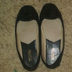 Pair of Michael Kors ballerinas in color black